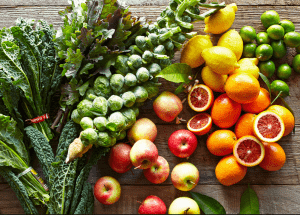 a group of fruits and vegetables on a wood surface Healthy Weight Loss Diets Leeds